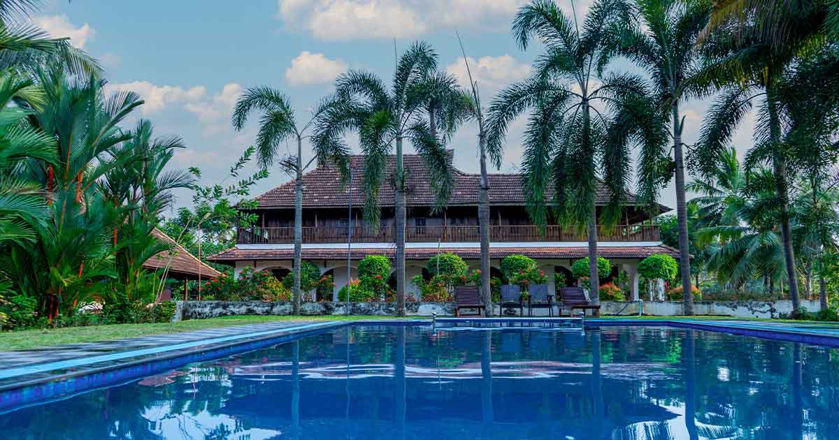 Escape and unwind in the best resort in Kumarakom with pool